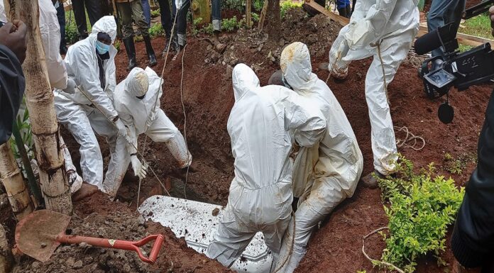 Man secretly buried at night exhumed