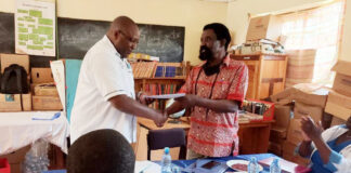Education official urges professionals to support their alma mater