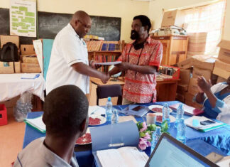 Education official urges professionals to support their alma mater