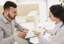 A patient signing a consent form to allow the medical personnel to proceed with the medical procedures on the patient. Consent is the backbone to being allowed to conduct any medical proceedings on any given patient. Photo/Kirsten Nunez