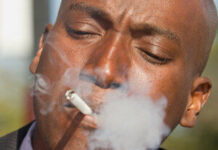 A person smoking. According to research, tobacco eventually kills half of its users. Photo/COURTESY