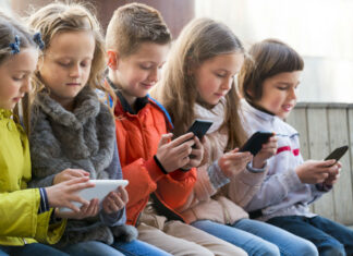 How digital technology is impacting your child’s life Children busy on smartphones. The use of technology, embedded on smartphones, Tablets, iPads and Computers has been on the rise among children. Parents should be concerned about what their children are accessing online. Photo/iStock