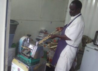 Food Security: Kisumu’s Magnam Environmental Network improving members’ livelihoods Michael Otieno Nyaguti. Founder and member of Magnam Environmental Network in Kisumu County is crushing sugarcane to produce Sugarcane juice at his Otonglo business premises. PHOTO/ Gilbert Ochieng.