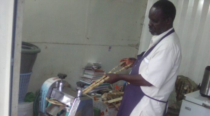 Food Security: Kisumu’s Magnam Environmental Network improving members’ livelihoods Michael Otieno Nyaguti. Founder and member of Magnam Environmental Network in Kisumu County is crushing sugarcane to produce Sugarcane juice at his Otonglo business premises. PHOTO/ Gilbert Ochieng.