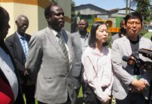 From Left: Dr Robert Mainya, GCFCU C.E.O, Ms Park Soyoung, the South Korean Embassy to Kenya official and Mr Kang Sunggyu, Director Greenbeans Company, hold a press briefing at the GCFCU Headquarters in Kisii after signing a trade deal on direct coffee export from Kisii to Korea. PHOTO/Ben Oroko, The Scholar Media Africa.