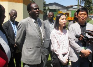 Gusii Coffee Union, Korean Company trade pact raises coffee farmers’ expectations From Left: Dr Robert Mainya, GCFCU C.E.O, Ms Park Soyoung, the South Korean Embassy to Kenya official and Mr Kang Sunggyu, Director Greenbeans Company, hold a press briefing at the GCFCU Headquarters in Kisii after signing a trade deal on direct coffee export from Kisii to Korea. PHOTO/Ben Oroko, The Scholar Media Africa.