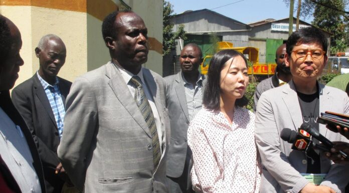 Gusii Coffee Union, Korean Company trade pact raises coffee farmers’ expectations From Left: Dr Robert Mainya, GCFCU C.E.O, Ms Park Soyoung, the South Korean Embassy to Kenya official and Mr Kang Sunggyu, Director Greenbeans Company, hold a press briefing at the GCFCU Headquarters in Kisii after signing a trade deal on direct coffee export from Kisii to Korea. PHOTO/Ben Oroko, The Scholar Media Africa.