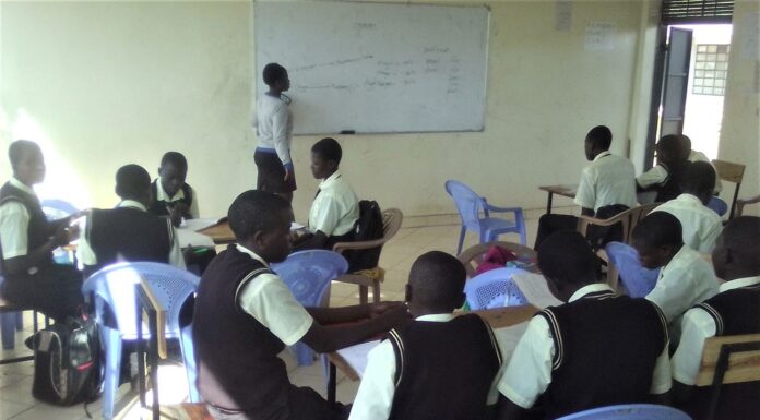 Preparations to host pioneer JSS students in Busia crystallize A teacher at Peter Habenga Okondo secondary School in Budalangi, Busia County talking the students through a lesson. PHOTO/Gilbert Ochieng, The Scholar Media Africa.