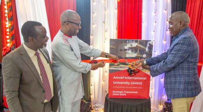 Amref University launches Five-Year Strategic Plan, boosts Africa’s Healthcare Mr. Joseph Ole Lenku (right), the Governor of Kajiado County, the hosting county to Amref International University (AMIU) and Dr. Githinji Gitahi, the Global Chief Executive Officer Amref Health Africa, the umbrella organization cutting the ribbon during the launch of the Strategic Plan 2022-2027, as Prof. Joachim Osur, the Vice Chancellor AMIU looks on. PHOTO/AMIU.