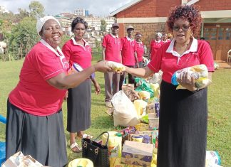 Celebrating Through Sharing: A case of Purity Int’l Ministries charity initiative Members of the Purity International Ministries Group, an initiative helping widows and widowers in Kisii Town, receiving Christmas gifts on December 24, 2022, at the Pentecostal Evangelistic Fellowship of Africa ( PEFA) Kisii Cathedral grounds. PHOTO/Courtesy.