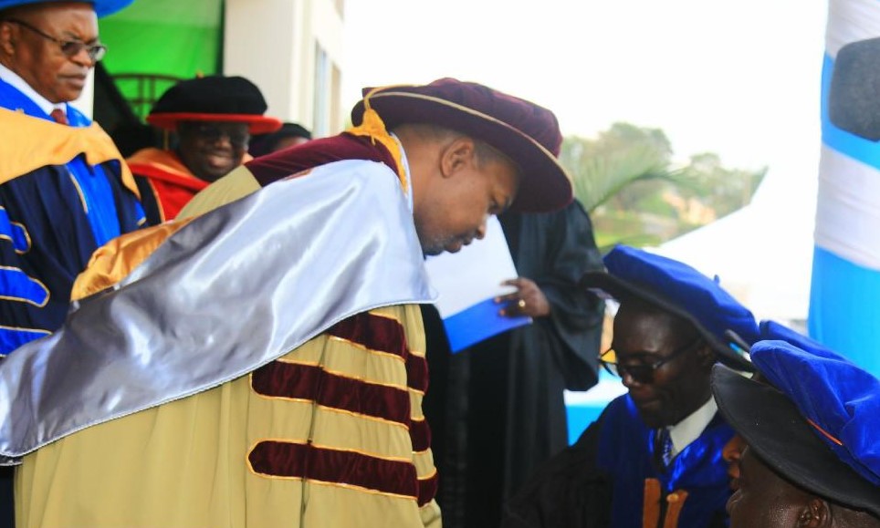 Dr. Bob Ndubi, the Kisii University Chancellor, conferring Ph.D. degrees to some of the graduands. PHOTO/KSU Media Team.