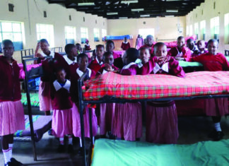 What abolishing boarding primary schools means Girls in a dormitory at Naikarra Primary School in Narok. Pupils can board at the school or attend as day-scholars. The Education Ministry, through the Basic Education PS Dr. Belio Kipsang, announced plans to abolish the boarding section in primary schools starting January next year. PHOTO/Courtesy.