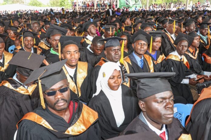 Graduates follow proceedings during Masinde Muliro University of Science and Technology (MMUST) 18th graduation ceremony on December 9, 2022. PHOTO/Presidential Communication Service (PCS)