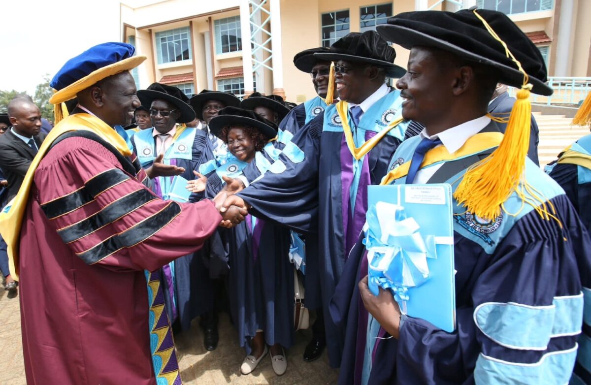 President William Ruto greeting some of the delegates ahead of the graduation ceremony. PHOTO/PCS.