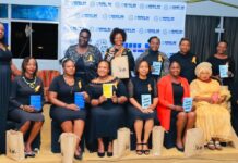 A group photo capturing the Gusii Women in Leadership Network (GWILN) High Tea event speakers with a gift bag equipped with books on Women Leadership. GWILN promotes a reading culture among women leaders. The event was held on December 3, 2022 to pave way for more Gusii women into leadership spaces. PHOTO/GWILN.