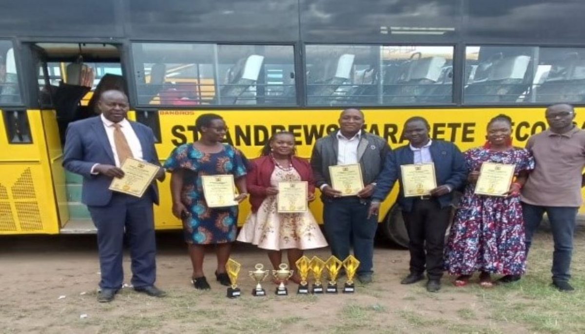 The principal and a portion of staff members, after receiving trophies for academic excellence awards in Naivasha sub-county. PHOTO/ Courtesy.