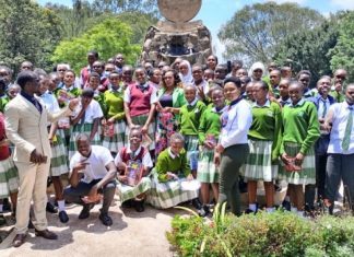 A focus on St. Andrews Tarabete Secondary, home of excellence, innovation, and self-reliance Mr. Bonface Otieno (L), Ms. Ruth Gitonga, Kabarak University staff members, and St. Andrews Tarabete Creative Writers and Book Club members after an inspiring creative writing workshop at Kabarak University last year. PHOTO/File.