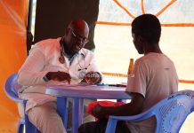 Dr. James Orodi, the Clinical Officer in charge of the Meet and Treat Outreach by Mercy Mission Hospital, James Orodiduring the program on February 9, 2023. PHOTO/Janet Kiriswo, The Scholar Media Africa.