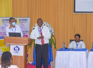 HEALTH: Hidden hope in overcoming cancer, a survivor’s story Evans Machera (center), a Nairobi-based city lawyer, addressing the First KUTRRH Annual Health Conference 2022 at the Kenyatta University Teaching, Referral & Research Hospital, two years after undergoing successful chemotherapy sessions at the health facility. PHOTO/Courtesy.