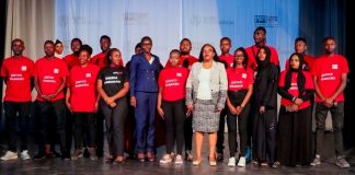 CRIME: Community Paralegals graduate ready to abate crime, step up justice Elizabeth Marube of National Police Service (in blue) and Zainab Abdul, a Principal Magistrate, pose for a photo with graduands during a community paralegals graduation at Sarakasi Dome, Nairobi, courtesy of Sheria Mashinani Initiative. PHOTO/Crime Si Poa (CSP).