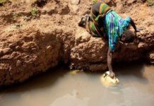 A woman fetching water. Millions of Kenyans have no access to clean water. The Water Project is determined to reduce the number by providing access to clean water for human and animal consumption. PHOTO/Courtesy.