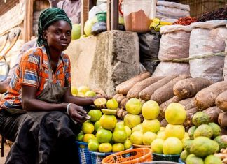 Women in Trade: Solving intra-African entrepreneurship puzzle An African woman trader selling her products. PHOTO/Unsplash.