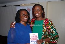 Dr. Mosinya Nyaberi poses with Judith Omondi during her book launch on March 9, 2023 at Sarova Panafric Hotel, Nairobi. The two were fellows in the KAGHLP 2021/22 cohort. PHOTO/Kemunto Ogutu, Scholar Media Africa.