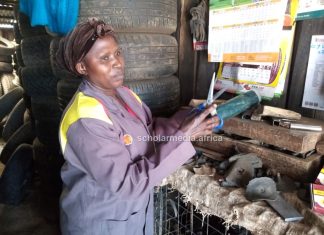 Breaking Barriers: Nzisa’s journey to becoming a mechanic Margaret Nzisa, who works at her brother's garage. PHOTO/Janet Kiriswo, Scholar Media Africa.