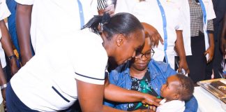 HEALTH: Kenyan mothers hail world’s first malaria vaccine A healthcare worker administer the malaria vaccine to a child during the launch of the accelerated use of the vaccine in Vihiga county. PHOTO/Ministry of Health.