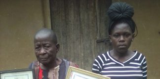 How Kundu, a traditional birth attendant, aids expectant mothers deliver Agnes Kundu, a Traditional Birth Attendant (TBA), showcasing her certificates. Alongside her is one of her clients. PHOTO/Gilbert Ochieng, Scholar Media Africa.