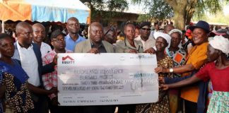 Thousands of Budalangi’s needy students to benefit from bursaries Raphael Wanjala (in orange shirt), MP Budalangi Constituency, presenting a cheque worth KSh33m for education bursary in Budalangi recently. PHOTO/ Gilbert Ochieng, Scholar Media Africa.