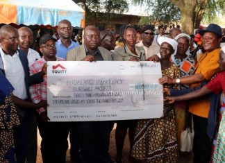 Thousands of Budalangi’s needy students to benefit from bursaries Raphael Wanjala (in orange shirt), MP Budalangi Constituency, presenting a cheque worth KSh33m for education bursary in Budalangi recently. PHOTO/ Gilbert Ochieng, Scholar Media Africa.