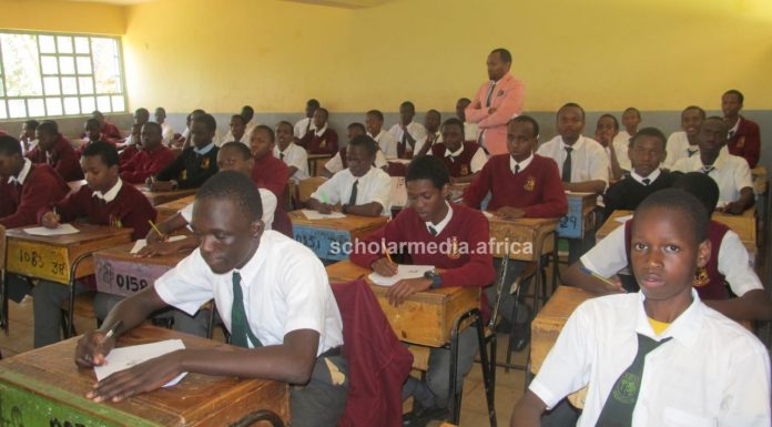 How award-winning Chief Principal is transforming Dagoretti High School Form Two Purple students of Dagoretti High School, an extra-county school in Nairobi, doing their examinations, supervised by Mr. Moses Mutinda. PHOTO/Tebby Otieno, Scholar Media Africa.