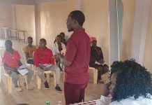 Mr. Bonface Otieno giving his input during a career training for youngsters by The Lake Region Journalism Clubs Association, on March 25, 2023, in Siaya county. PHOTO/Courtesy.
