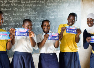 Menstrual Hygiene: Road to normalizing menstruation, defeating stigma School-girls holding sanitary pads in a classroom. As the world celebrates World Menstrual Hygiene Day on May 28, 2023, statistics show that in Africa, 1 in every 3 women cannot afford sanitary products. Destigmatizing menstrual health and providing girls and women with menstrual products is timely and vital. PHOTO/Courtesy.