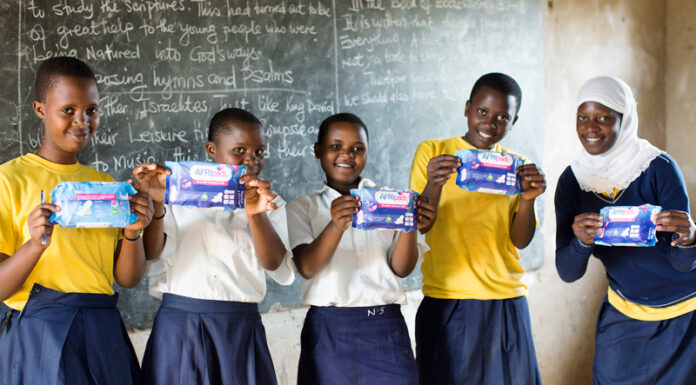 Menstrual Hygiene: Road to normalizing menstruation, defeating stigma School-girls holding sanitary pads in a classroom. As the world celebrates World Menstrual Hygiene Day on May 28, 2023, statistics show that in Africa, 1 in every 3 women cannot afford sanitary products. Destigmatizing menstrual health and providing girls and women with menstrual products is timely and vital. PHOTO/Courtesy.