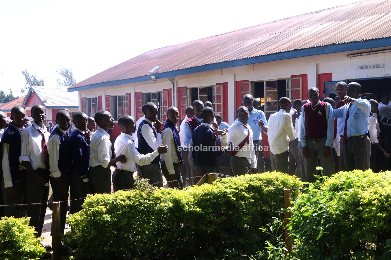 Students queuing outside the dining hall. PHOTO/Boaz Khuteka, Scholar Media Africa. 