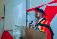 Prof. Joachim Osur, Vice Chancellor, Amref International University, presenting his inaugural professorial lecture at Amref International University (AMIU) on May, 12, 2023. PHOTO/AMIU.