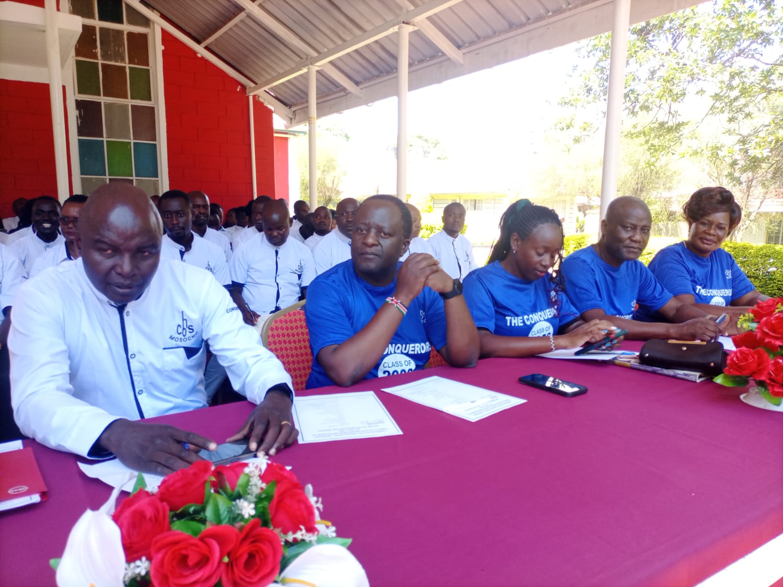Mr. Ombiru (left) with the guests during the launch of 2023 KCSE target mean and revision program on May 12, 2023, at the school's grounds. PHOTO/Courtesy.