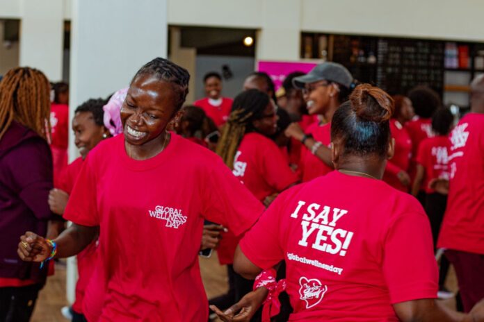 Participants dance as part of a wellness and healing session during Global Wellness Day celebrations last year at Nairobi Street Kitchen. This year's event will be on June 10, 2023 at Anzana Gardens, Nairobi. PHOTO/GWD Kenya.