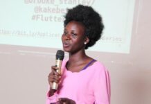 Lucy Alobo giving a speech to inspire young Innovators at the Flutter Forward event organized by Flutter, KaKebe Technologies, and Innovation Village, Uganda. She was orphaned while aged one but struggled until she became the inspirational woman she is. PHOTO/Courtesy.