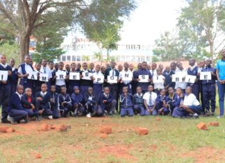 ENVIRONMENT: University staff sensitizing communities on waste management Everlyn Kimibei (second right), a staff at Kisii University, poses for a photo with learners from Kisii Primary School and some of their teachers. She's leading a group sensitizing pupils and the general public concerning waste management and environmental conservation. PHOTO/Courtesy.