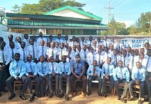 Student Council body of St. Mary's Ukwala High School pose for a photo at the main gate. Photo/Bonface Otieno, Scholar Media Africa.