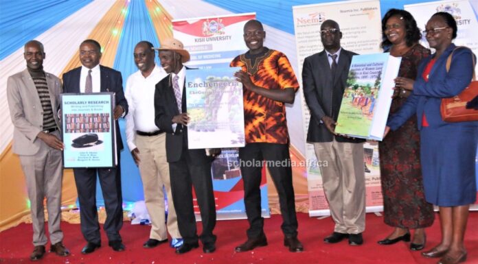 Language and Research: Jubilation as scholars launch books, dictionary From left: Dr. Peter Mose, Prof. John Akama, Dr. Evans Mecha, Mzee Peter Getenga, Dr. Peter Otieno, Prof. Nicolas Makana, Dr. Marion Onyambu and Dr. Prisca Tanui hold their two books and a dictionary during the launch on May 31, 2023 at Kisii University. PHOTO/Boaz Khuteka, Scholar Media Africa.