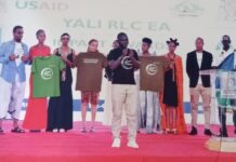 Alex Ogwal (center) presenting a poem in sign language in Nairobi to create awareness about uniqueness of sign language. He has been championing the need for sign language spaces where the wider communities come together to have discourse in sign language. PHOTO/Courtesy.