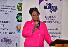 Dr. Anana Phifer-Derilhomme, Founder of BlessedGirl Global and a World Civility Ambassador, addresses participants during a BlessedGirl conference in Nairobi on July 15, 2023, before embarking on a tour to different schools and places donating sanitary pads and panties. PHOTO/BlessedGirl.