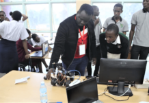 A member of the Uganda Christian University (UCU) Robotics team exhibits one of UCU’s homemade robots to Ntare High School students. Young learners needs more and regular exposure to technology-sensitive skills to equip them for the changing world. PHOTO/Irene Nyapendi.
