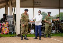 Dr. Jibril Ssemakula, a professional clinician and Founder, Million Trees International Organisation, receiving an appreciation award from the UPDF CDF Gen Wilson Mbadi in February 2023. The entity has been on a mission to plant as many trees in Uganda and restore forest cover. PHOTO/MTIO.