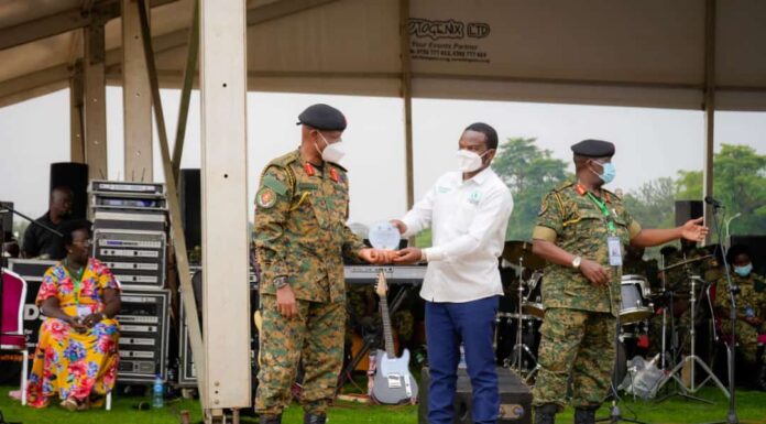Uganda: Million Trees Int’l Organisation planting hope for a greener planet Dr. Jibril Ssemakula, a professional clinician and Founder, Million Trees International Organisation, receiving an appreciation award from the UPDF CDF Gen Wilson Mbadi in February 2023. The entity has been on a mission to plant as many trees in Uganda and restore forest cover. PHOTO/MTIO.