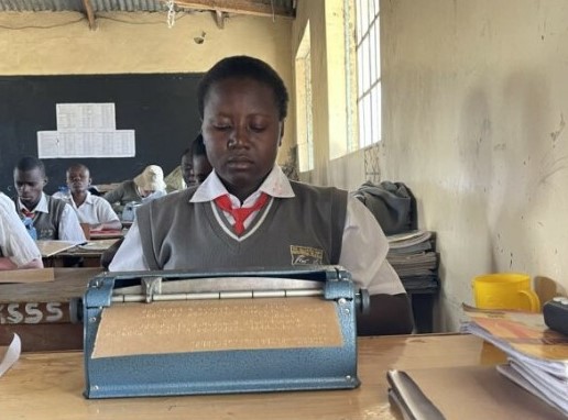 A visually impaired girl using a braille. Brailles and reading orbits are very expensive, yet the basic tools learners with visual impairment require, among other assistive tools, for their education. PHOTO/Courtesy.